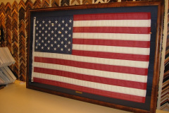 Framed American flag flown over the White House